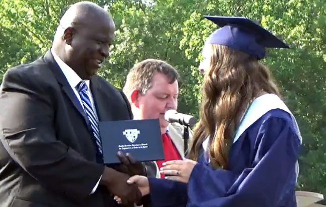 In all, 21 students received their diplomas.